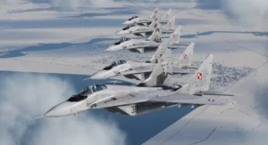 Польські винищувачі МіГ-29 у формації над засніженою місцевістю
